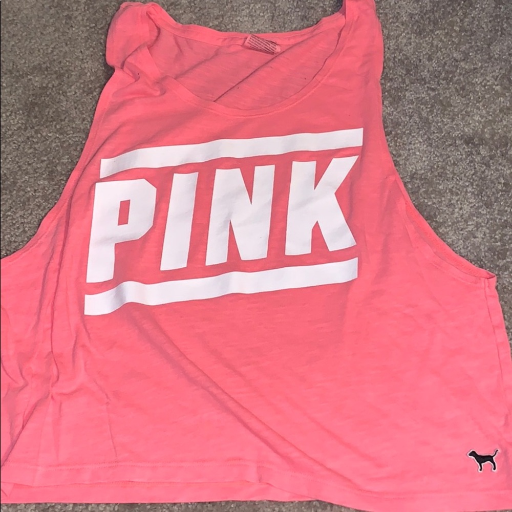 Pink athletic shirt. Fits like a small